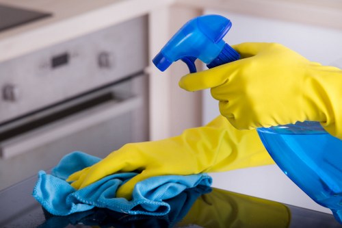 Carpet cleaning technician preparing safe equipment and workspace